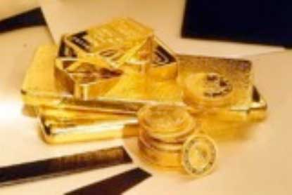 Photo of gold bars and coins